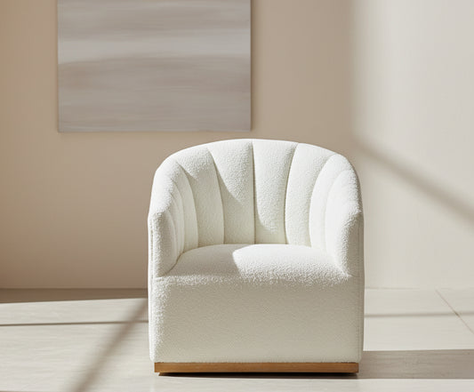 White upholstered armchair on a white background
