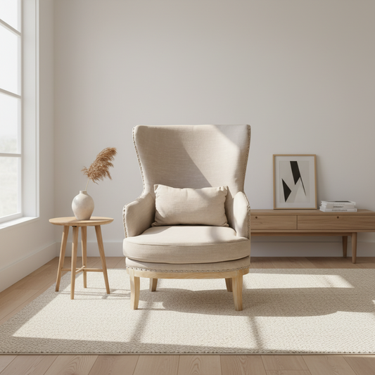 Beige armchair with a pillow on a white background