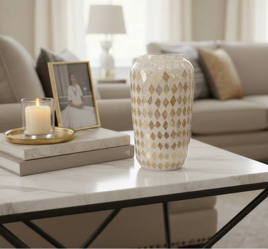 Decorative vase with diamond pattern on a white surface