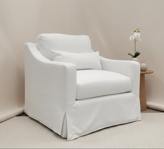 White armchair with a pillow on a white background