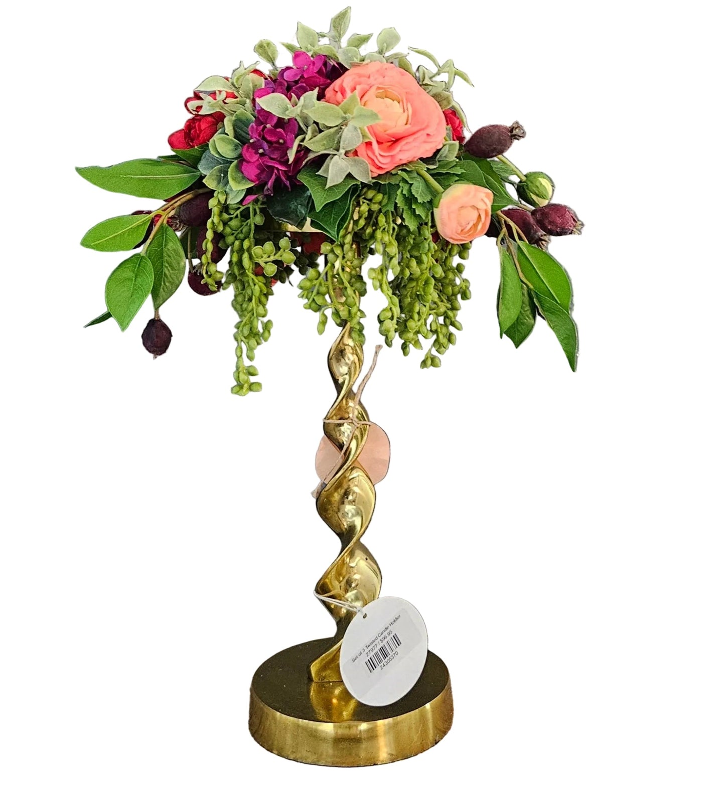Decorative floral arrangement on a gold spiral stand with a white background