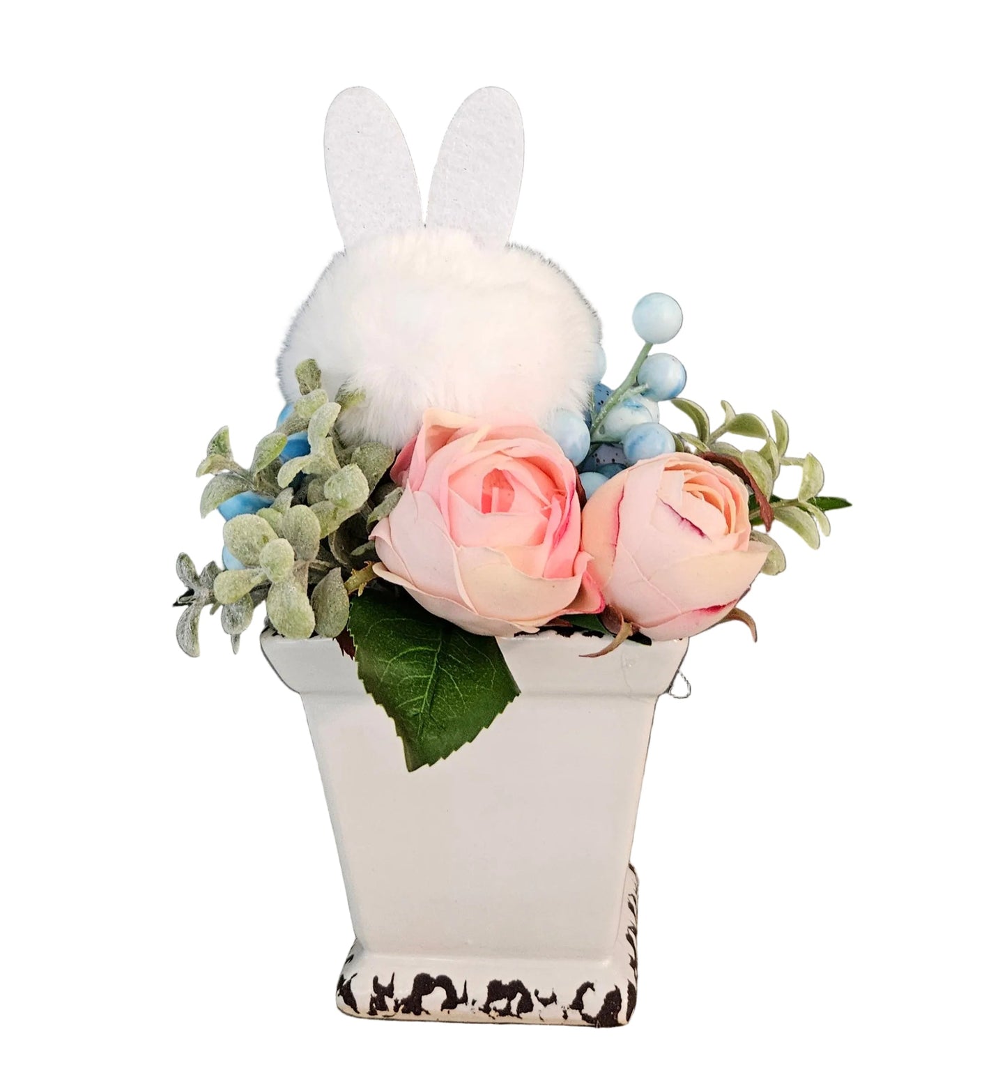 Decorative item with a rabbit head, flowers, and a white container on a white background