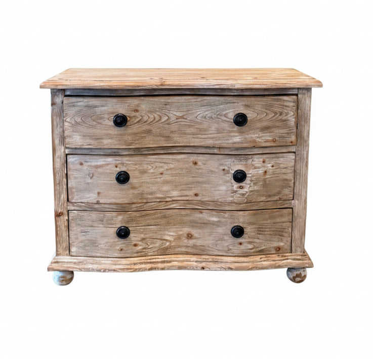 Wooden dresser with three drawers and black handles on a white background