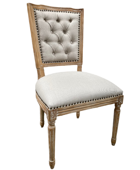 Decorative chair with tufted backrest and white cushion on a white background