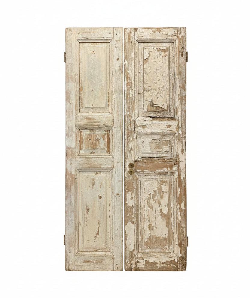 Pair of aged wooden doors on a white background