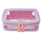 Pink and purple cosmetic case with tassel on a white background