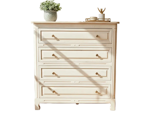 Wooden dresser with four drawers on a white background