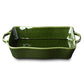 Green rectangular ceramic baking dish on a white background