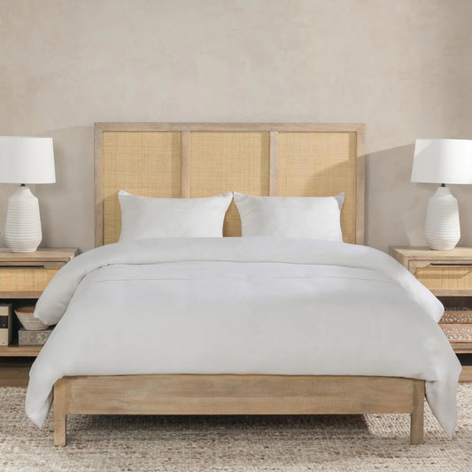 Light mango wood bed with rattan headboard