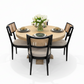 Round solid mango wood dining table with chairs in a room with a white background.