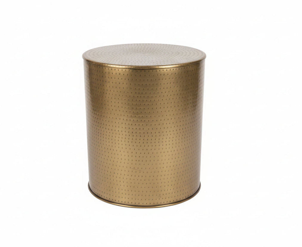Gold metallic side table with textured surface on a white background