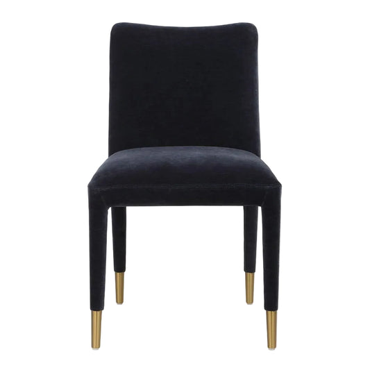 Navy blue velvet chair with gold legs on a white background