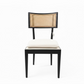 Chair with black frame and woven backrest on a white background
