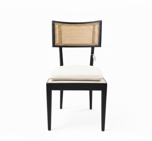 Chair with black frame and woven backrest on a white background