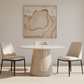 Wooden table with a round top and slatted base on a white background
