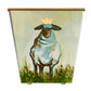 Painted container with a sheep wearing a crown in a grassy field