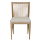 Wooden chair with a white cushion on a white background
