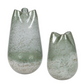 Two textured glass vases on a white background