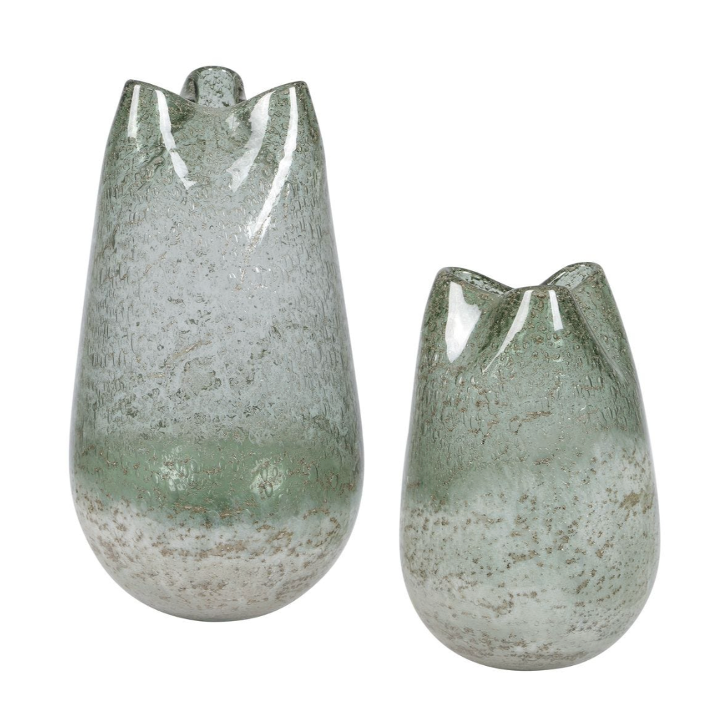 Two textured glass vases on a white background