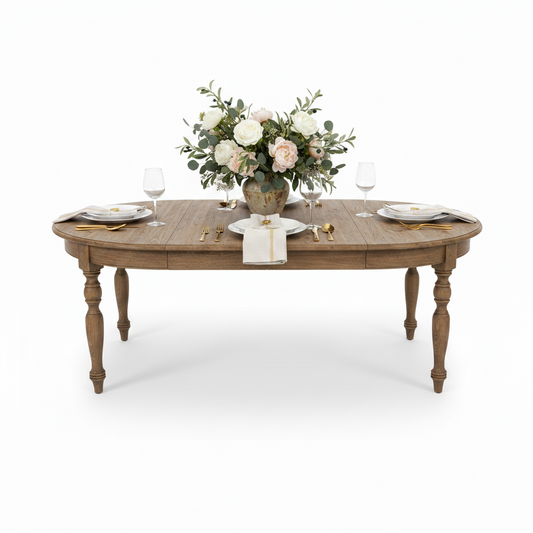 Wooden dining table with extended leaves in a studio setting