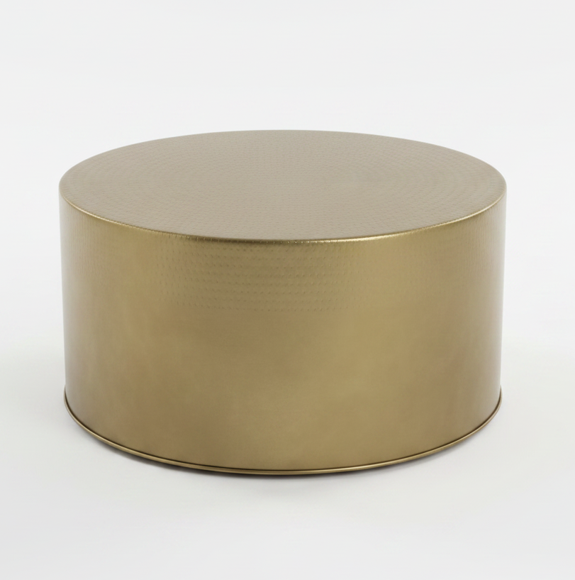 Gold metal round coffee table on a white background