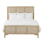 Wooden bed with wicker accents and white bedding on a white background