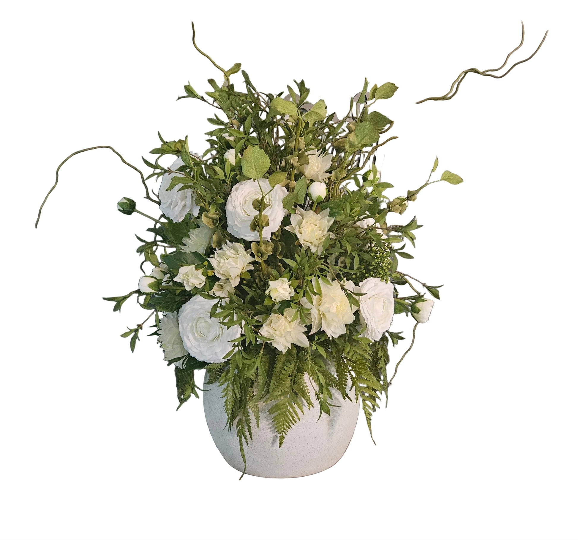 Floral arrangement in a white vase on a wooden surface with decorative text in the background.