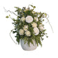 Bouquet of white flowers in a vase on a white background