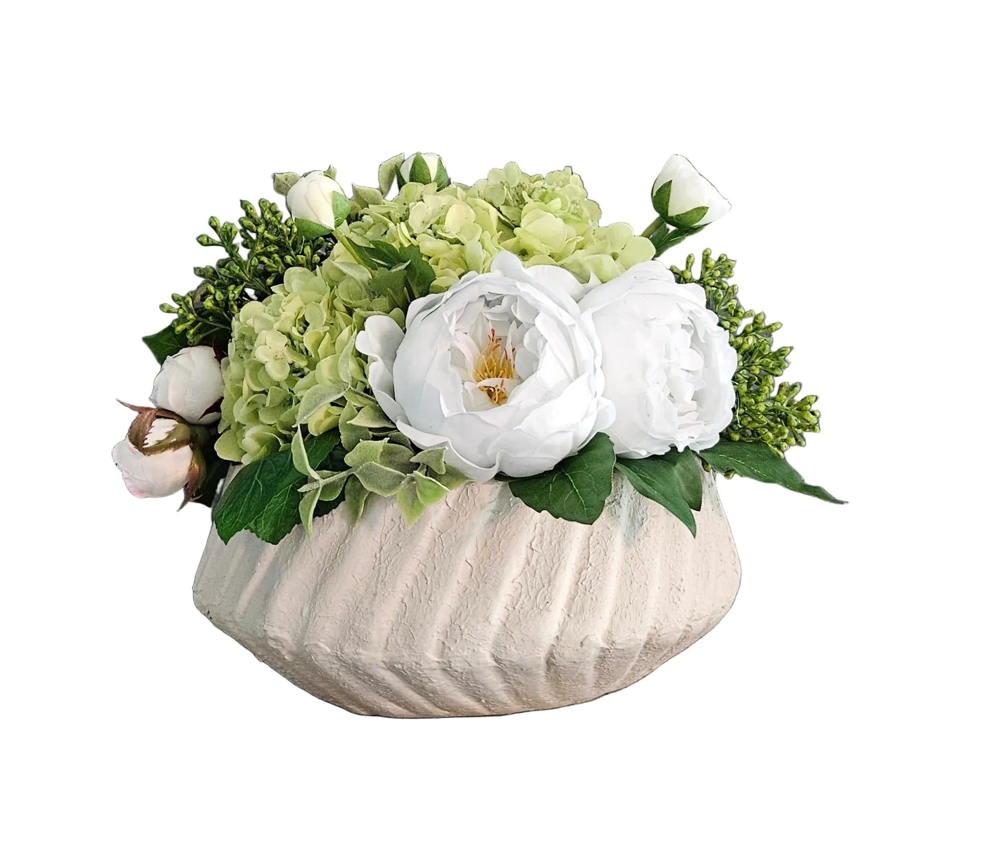 Decorative flower arrangement in a textured vase on a rustic wooden surface with a gray wall background.